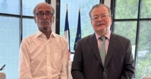 Pakistani-origin newspaper vendor Ali Akbar meets French Ambassador Nicolas Galey after receiving France’s Ordre national du Mérite for decades of public service in Paris.