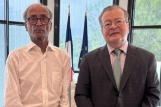 Pakistani-origin newspaper vendor Ali Akbar meets French Ambassador Nicolas Galey after receiving France’s Ordre national du Mérite for decades of public service in Paris.