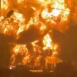 Firefighters respond after a Russian missile strike damaged buildings in Kyiv, Ukraine.
