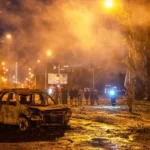 Firefighters respond after a Russian ballistic missile strike damaged warehouses and buildings in Kyiv, Ukraine.