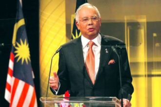 Malaysia’s former PM Najib Razak is working to meet conditions for house arrest, including payment of a 50 million ringgit fine.