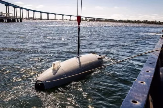Iran’s IRGC says it captured a US underwater drone near the Strait of Hormuz, while Washington says the older vehicle had malfunctioned.