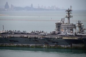 The US Navy says eight personnel in the USS Abraham Lincoln carrier strike group attempted suicide during its extended deployment in the Middle East.