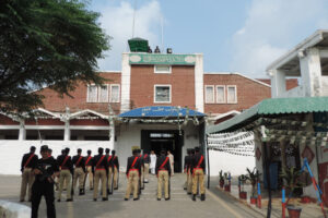 Six Punjab prison officials have been suspended after a clash at Lahore’s Kot Lakhpat Jail left one prisoner dead and four others injured.